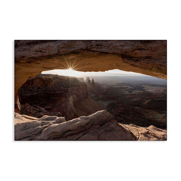 Stupell Industries Peeking Through Desert Arch by Danita Delimont Unframed Nature Graphic Art Print 16 in. x 24 in.