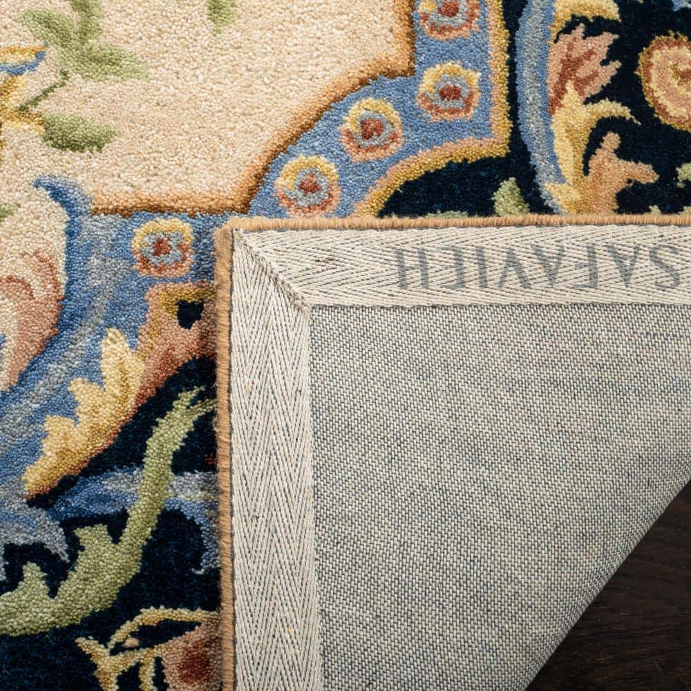 Ivory Handmade Wool Tufted 9' x 12' Rectangular Rug