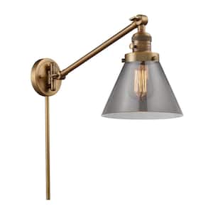 Franklin Restoration Cone 8 in. 1-Light Brushed Brass Wall Sconce with Plated Smoke Glass Shade with On/Off Turn Switch