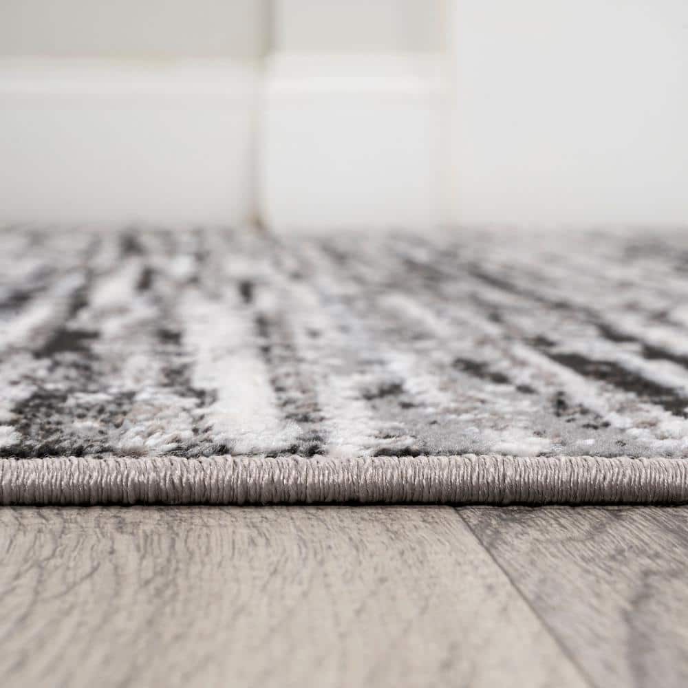 Black and Gray 8' x 10' Stripe Synthetic Area Rug