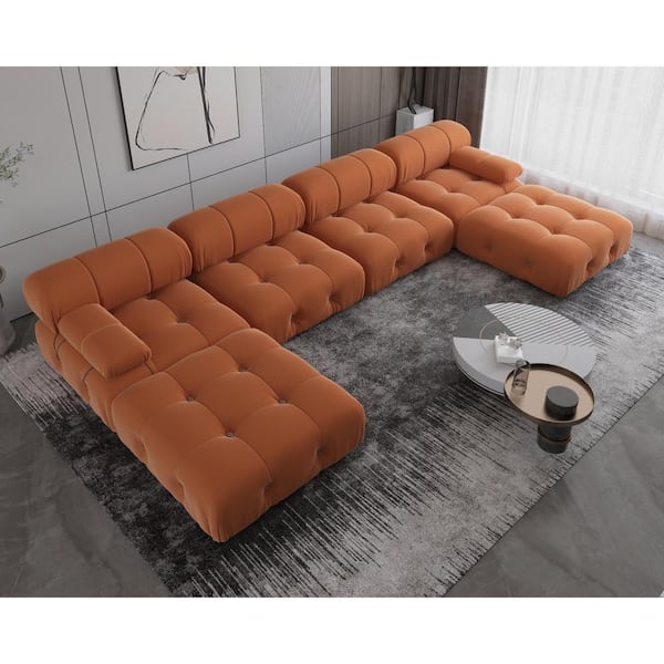 https://images.thdstatic.com/productImages/95348251-85c6-4e84-bd95-0f25d23e191f/svn/orange-j-e-home-sectional-sofas-je-sf105or-64_600.jpg