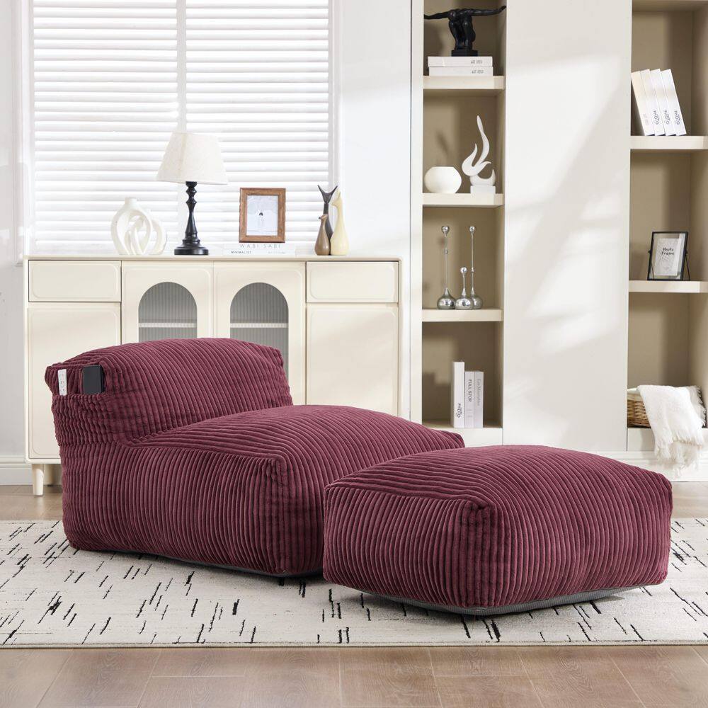 Wine red corduroy bean bag chair with matching ottoman.