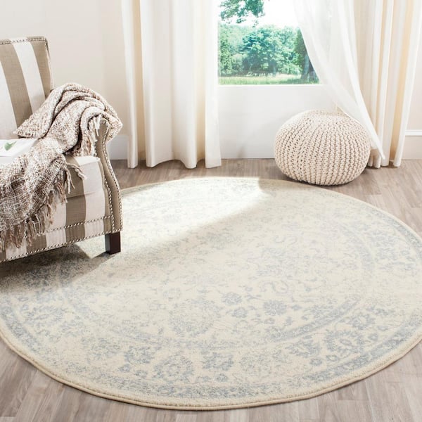 Adirondack 10 ft. x 10 ft. Ivory/Slate Border Distressed Round Area Rug