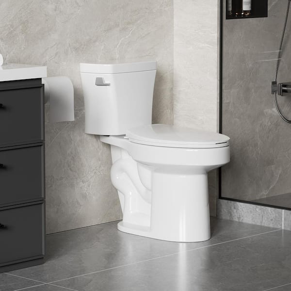 Two-Piece 1.28 GPF Elongated Toilet with Side Flush Leverin Gloss White with Soft Close Seat