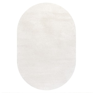 Haze Solid Low-Pile Cream 6 ft. x 9 ft. Oval Area Rug