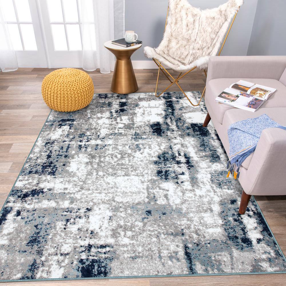 Abstract Blue Tufted Synthetic 7' 10" x 10' Area Rug