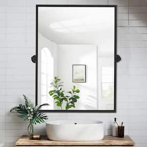 26 in. W x 38 in. H Rectangular Metal Framed Pivoted Bathroom Wall Vanity Mirror in Black