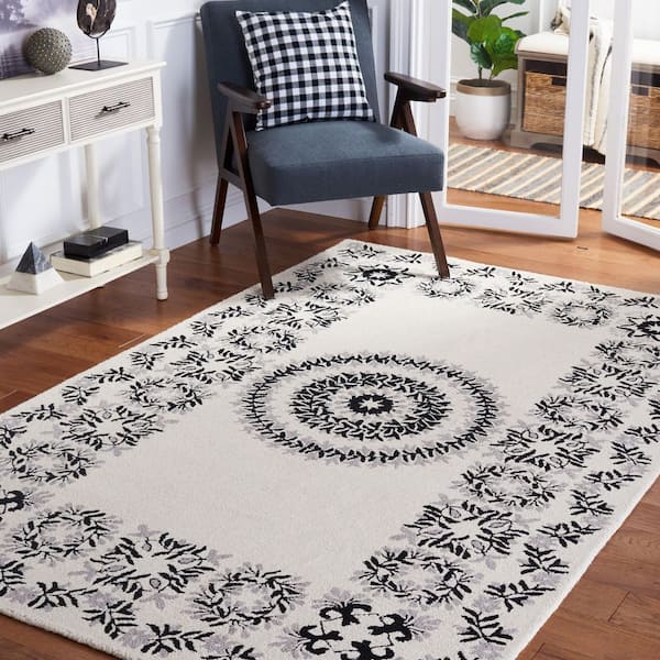 Empire 8 ft. x 10 ft. Ivory/Black Border Medallion Area Rug