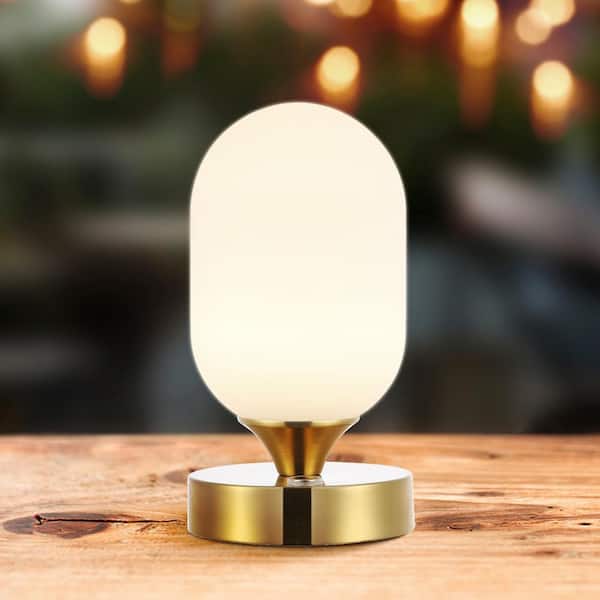 https://images.thdstatic.com/productImages/958abd78-323c-48b6-90bf-5a20788d32ef/svn/brass-gold-jonathan-y-table-lamps-jyl7111c-64_600.jpg