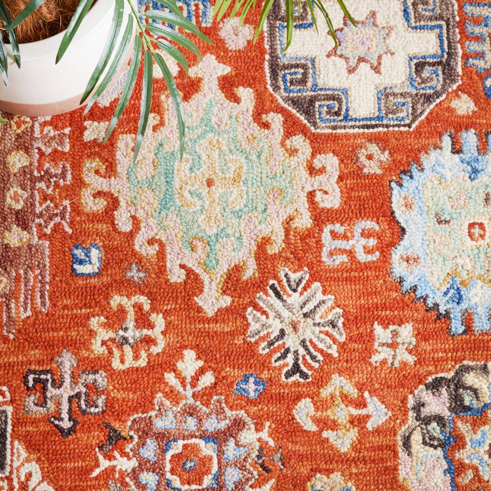 Ivory and Rust Handmade Wool Tufted Rectangular Area Rug 5' x 8'