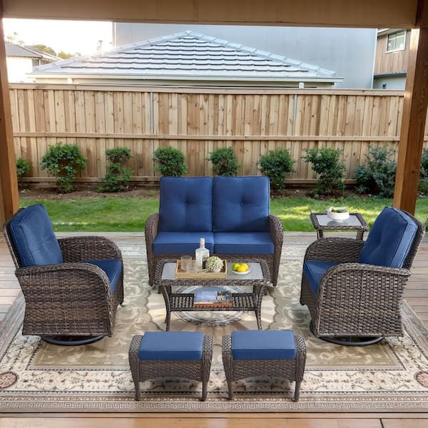 Opohoro Brown 7-Piece Wicker Patio Conversation Set with Swivel Rockers, Outdoor Glider Seating Set with Navy Blue Cushions
