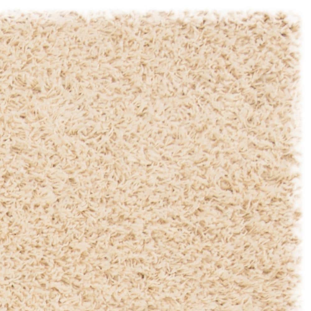 Ivory 9' x 12' Shag Wool and Synthetic Rug