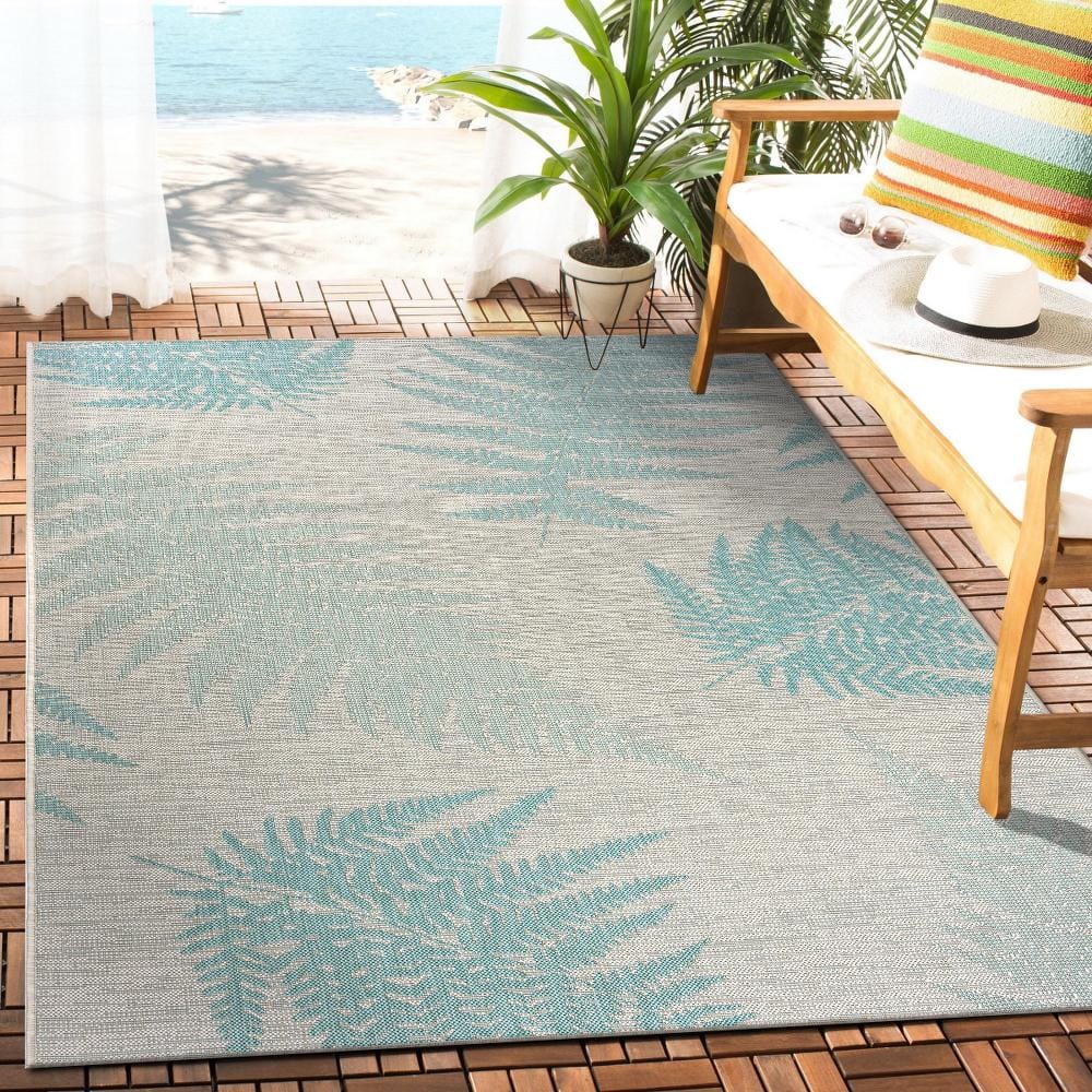Teal and Cream Synthetic Flat Woven 8' x 10' Area Rug