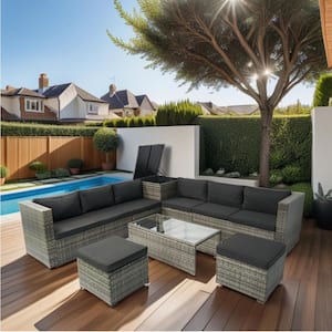 8-Piece Gray Wicker Outdoor Patio Sectional Set with Storage Box, Clear Glass Tabletop and Black Cushions