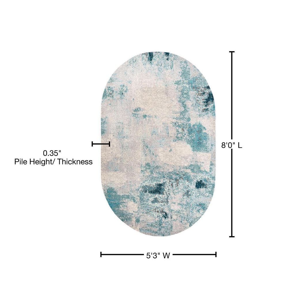 Cream and Blue Abstract Oval Synthetic Area Rug
