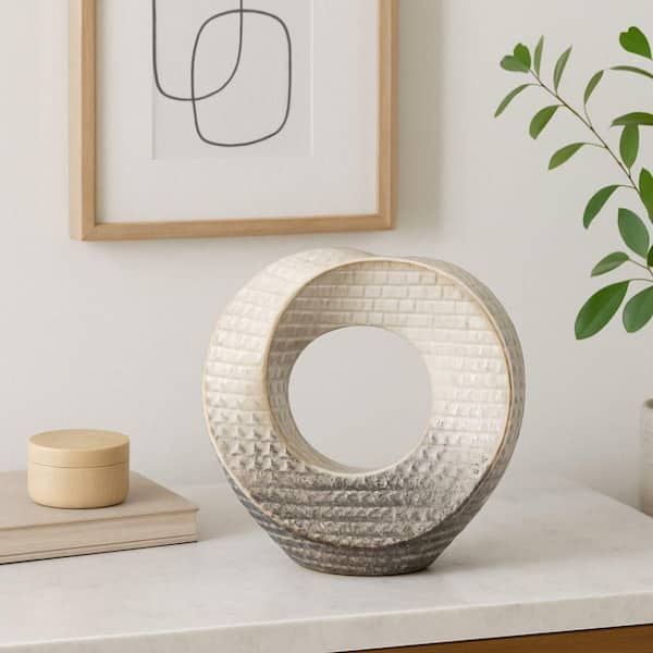 Liv & Skye Ivory 8.25 in. x 8 in. Ceramic Abstract Circular Cutout Sculpture