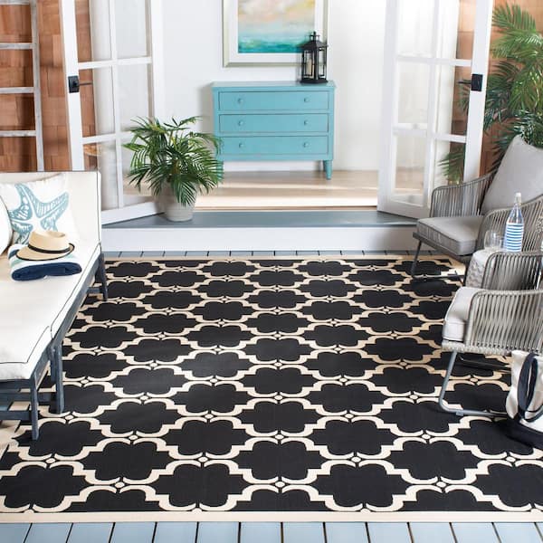 https://images.thdstatic.com/productImages/960070c4-2c38-4750-887e-340330adde9a/svn/black-beige-safavieh-outdoor-rugs-cy6009-226-810-e1_600.jpg