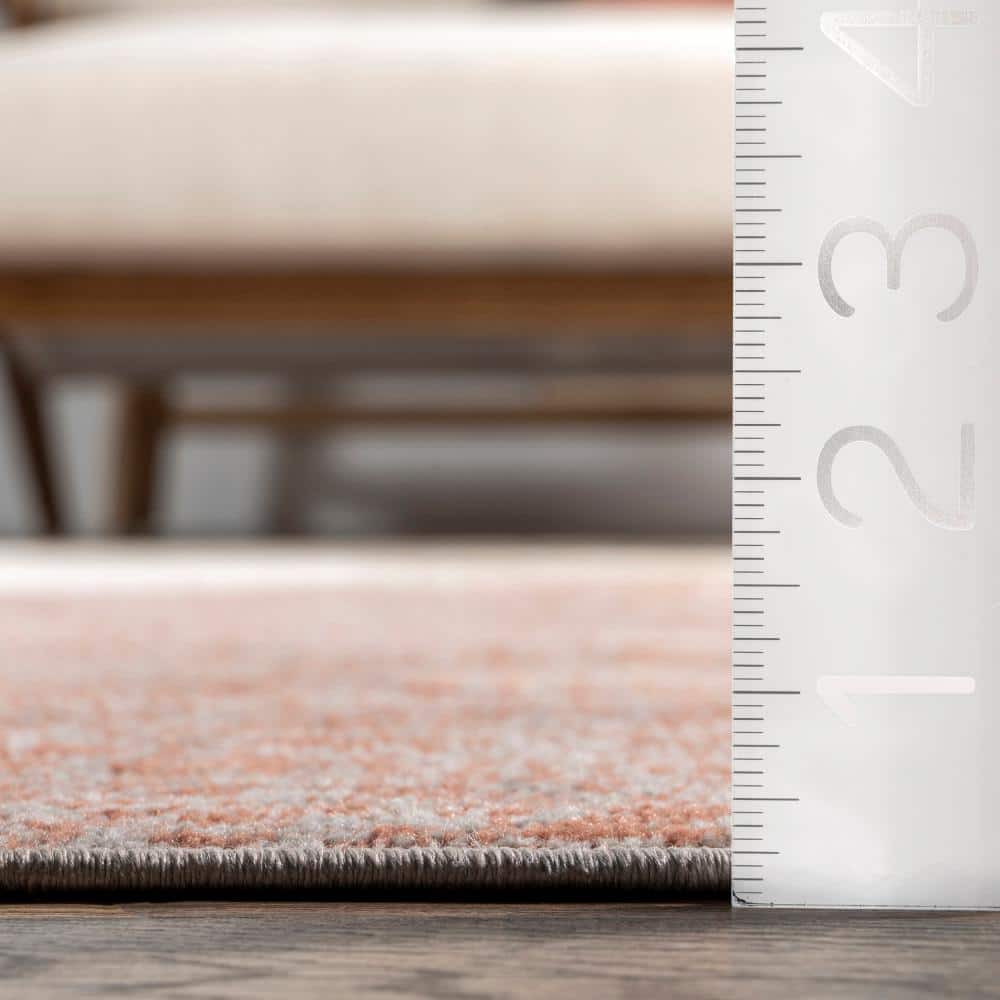 4' x 6' Red and Beige Abstract Synthetic Area Rug