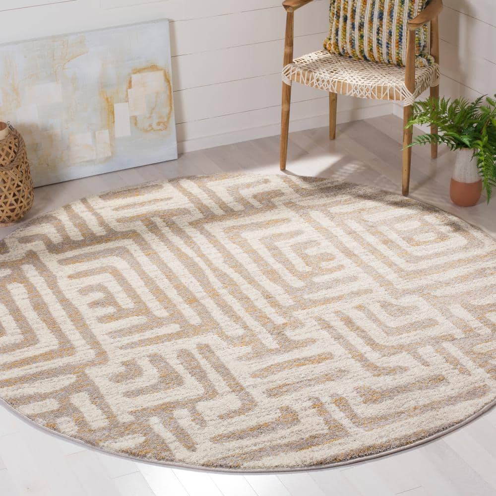Ivory and Mauve Round Synthetic Abstract Area Rug