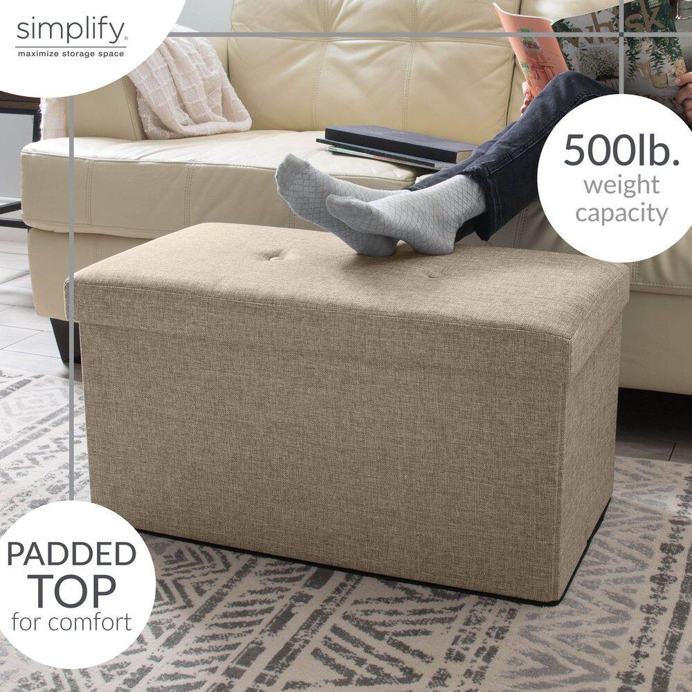 Natural linen look double folding storage ottoman being used as a footrest.