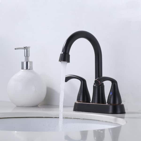 4 in. Centerset Double Handle High Arc 360° Swivel Bathroom Faucet with Drain Kit and Supply Lines in Oil Rubbed Bronze