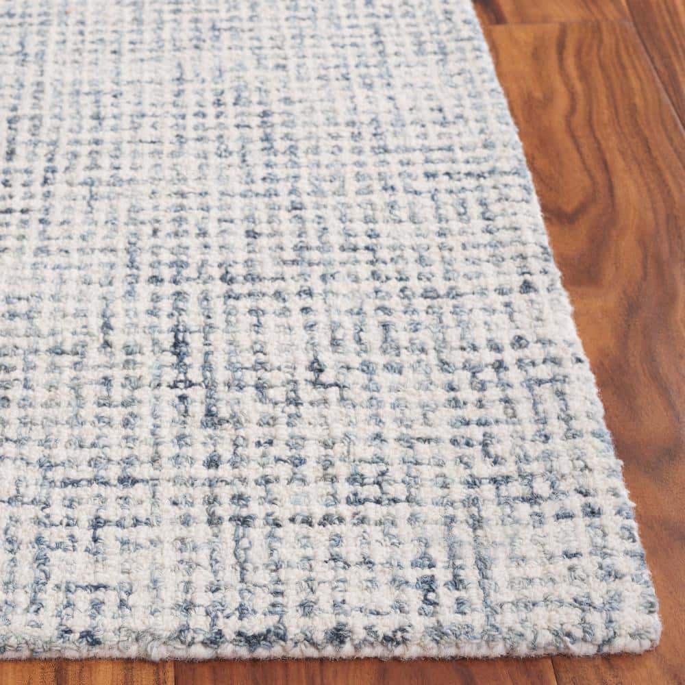 Handmade Blue and Ivory Wool Blend Tufted Rectangular Rug 3' x 5'