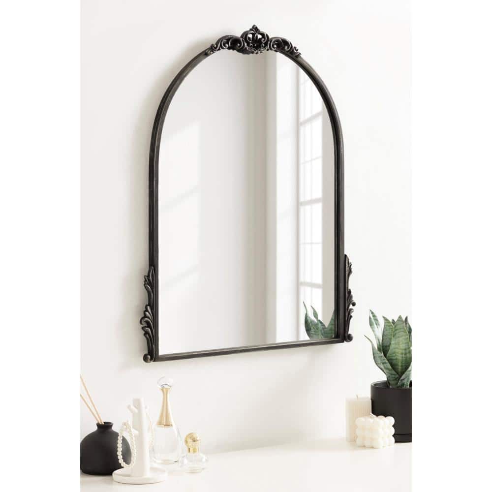 Myrcelle Antique Black Arched Wall Mirror with Ornate Garland Details
