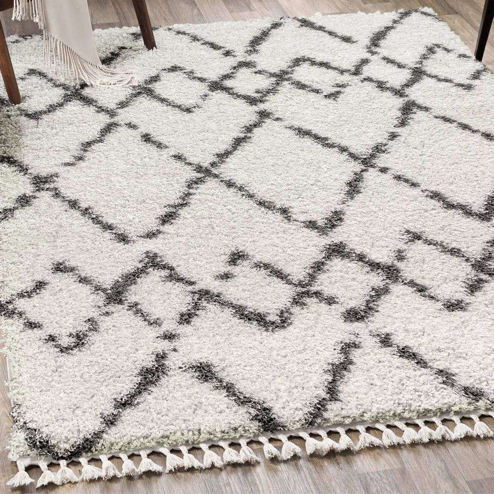 4' x 6' Grey and Ivory Synthetic Shag Area Rug