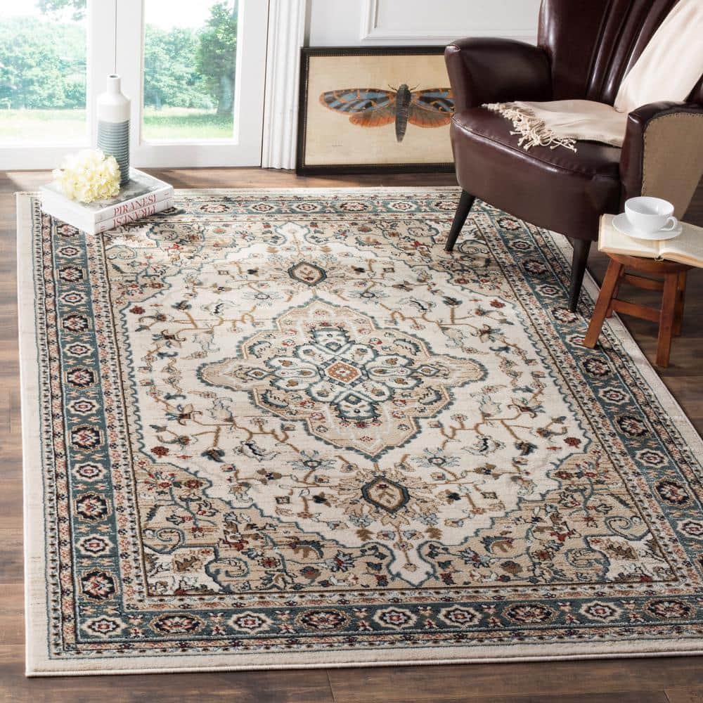 Cream and Beige Synthetic Traditional Area Rug