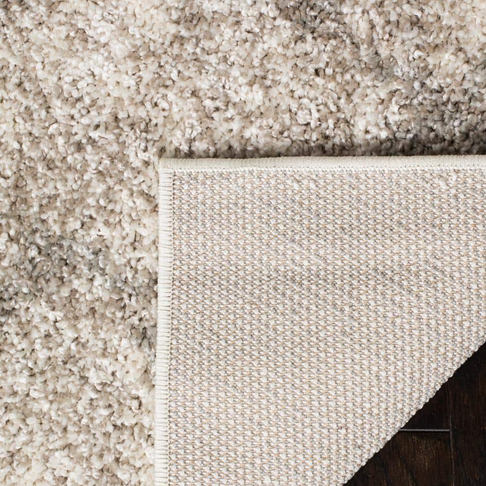 6' x 9' Gray and Cream Shag Area Rug