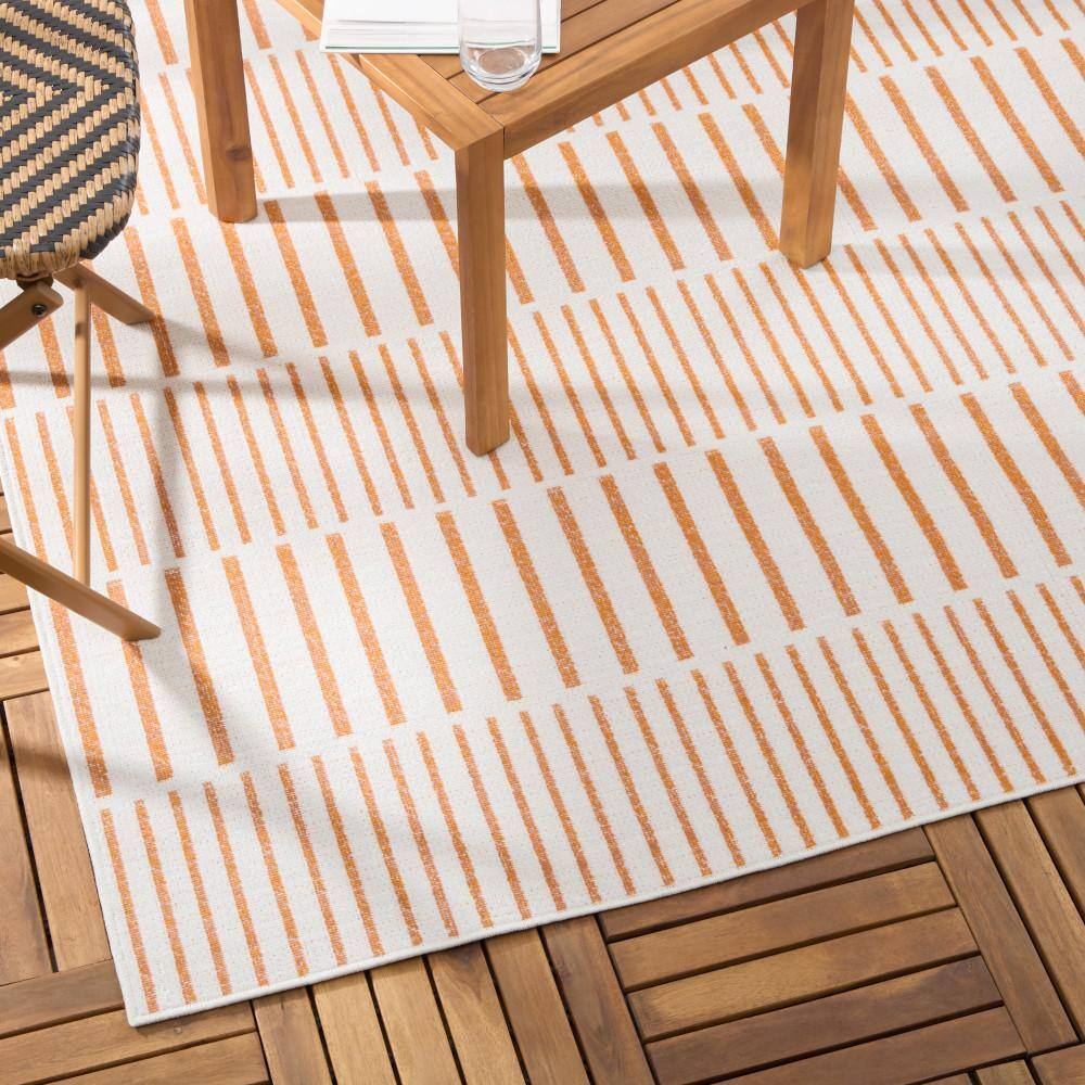 Ivory and Orange Synthetic Stripe Indoor/Outdoor Area Rug
