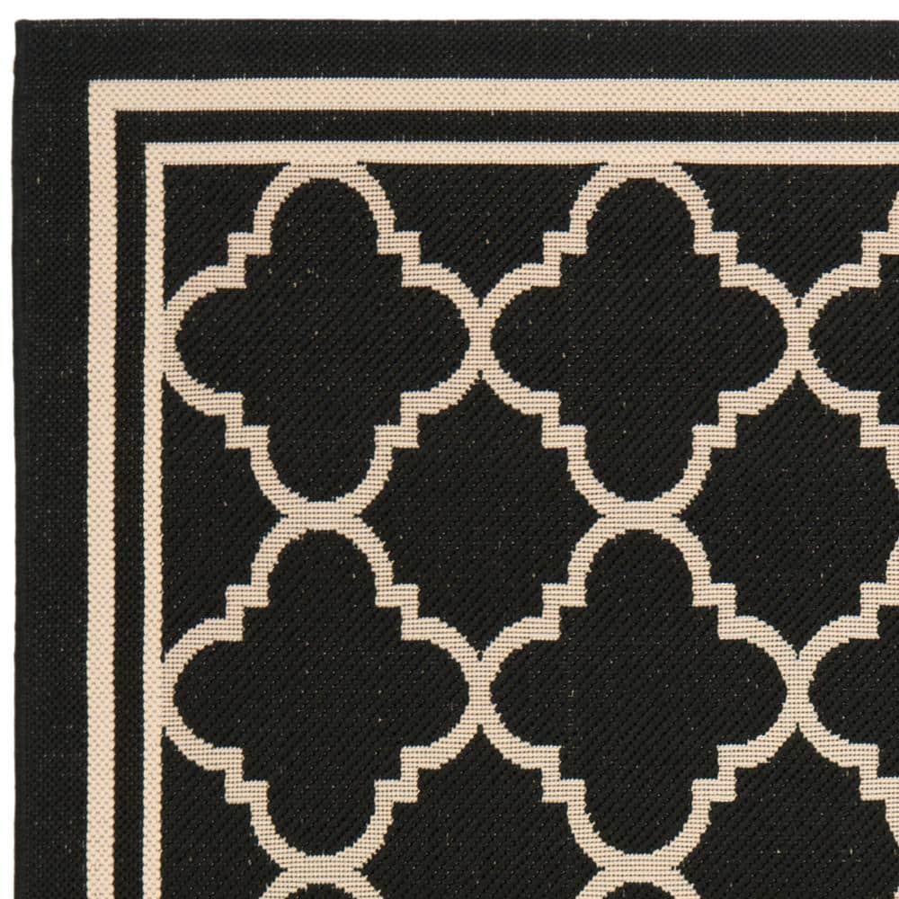 Black and Beige Geometric Outdoor Area Rug 4' x 5'7"