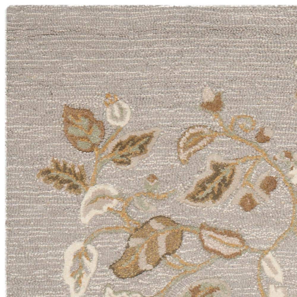 Hand-Tufted Green Floral Wool and Viscose Area Rug, 5' x 8'