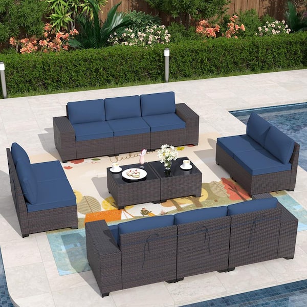 12-Piece Brown Wicker Outdoor Sectional Set with Glass Coffee Table and Navy Blue Cushions, Patio Chat