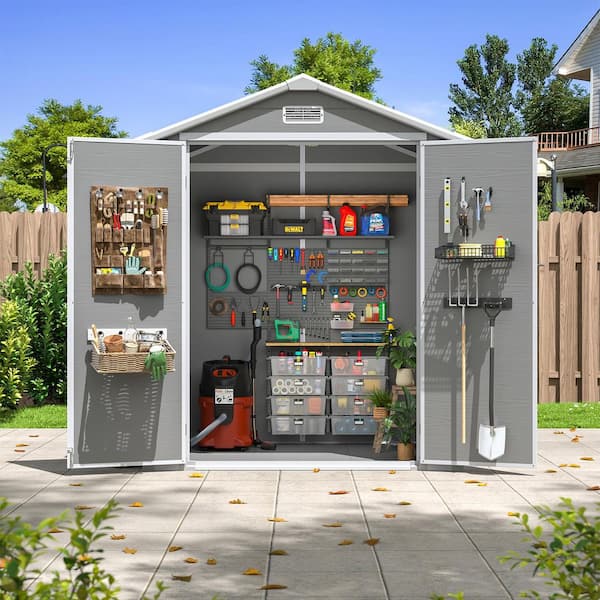Sizzim 6.3 ft. W x 4.4 ft. D Outdoor Gray Resin Storage Plastic