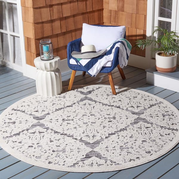 https://images.thdstatic.com/productImages/9687cb04-7d1b-4cf7-9d22-14404bec900e/svn/ivory-gray-safavieh-outdoor-rugs-cbn660a-7r-e1_600.jpg