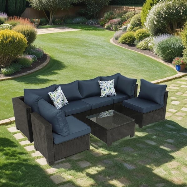 Cesicia Outdoor Coffee 7-Piece Wicker Patio Conversation Set with Dark Blue Cushions and Pillows