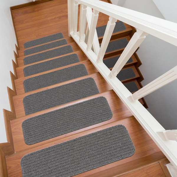 https://images.thdstatic.com/productImages/96b38594-947e-4023-92bb-440959e2f94d/svn/gray-beverly-rug-stair-tread-covers-hd-trd10955-8pk-c3_600.jpg
