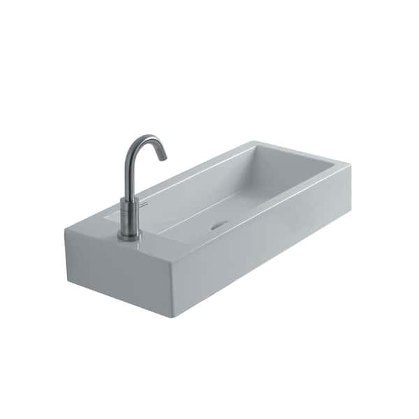 WS Bath Collections Wall Mounted Bathroom Sink in Ceramic White with Basin to the Right of the Faucet