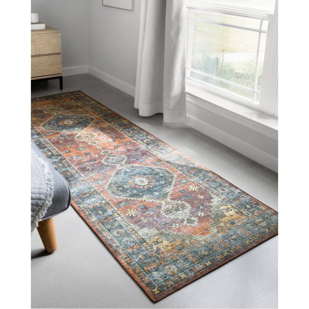 Blue and Rust Oval 6' x 9' Wool and Synthetic Area Rug
