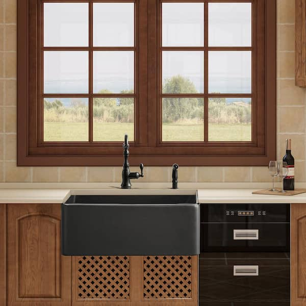 https://images.thdstatic.com/productImages/96d495ce-5deb-4455-9484-5f2fed2b0975/svn/matte-black-modland-farmhouse-kitchen-sinks-hdyc43f12b-64_600.jpg