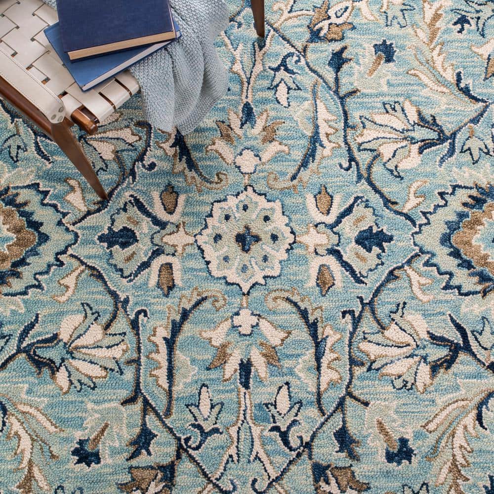Blue and Ivory Floral Wool 9' x 12' Area Rug