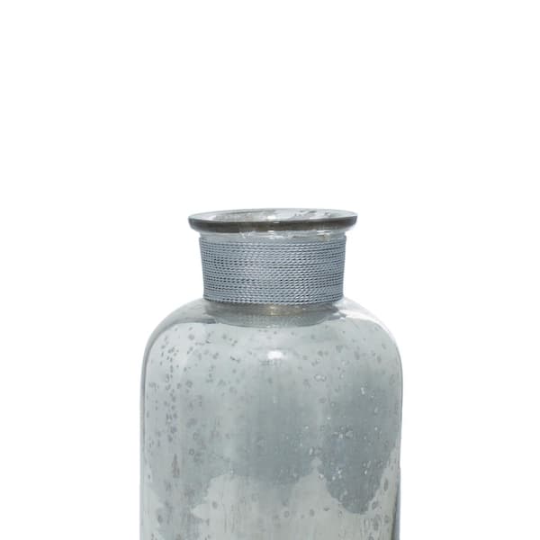 https://images.thdstatic.com/productImages/96e5fb12-1702-43a9-8391-891164a7ca92/svn/silver-litton-lane-decorative-bottles-24127-fa_600.jpg