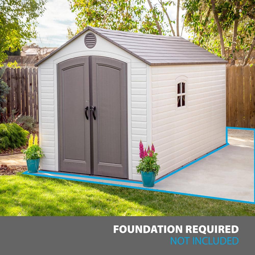 Large Beige and Brown Polyethylene Storage Shed with Windows and Shelving