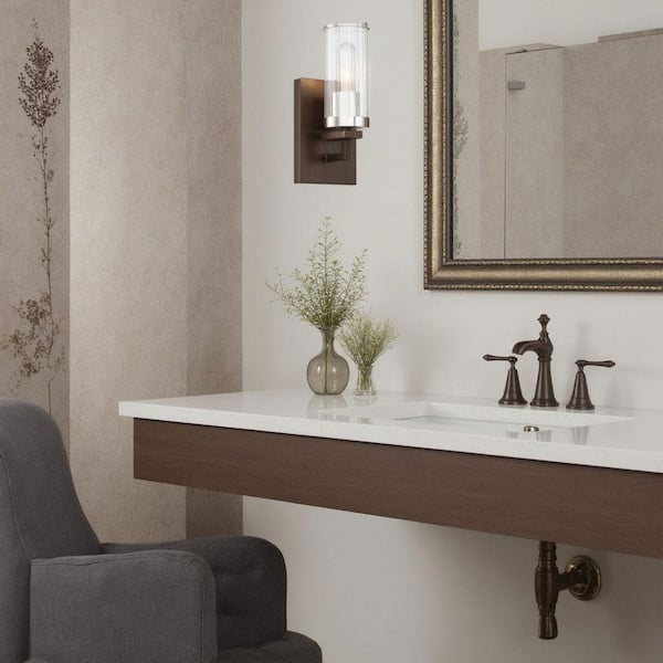 Maddox Roe 5 in. 1-Light Iron Ore with Gold Dust Highlights Wall Sconce with Clear Ribbed Glass Shade