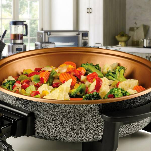 Ovente 12 In Copper Electric Skillet With Non Stick Aluminum Body Temperature Controller Tempered Glass Cover Sk11112co The Home Depot