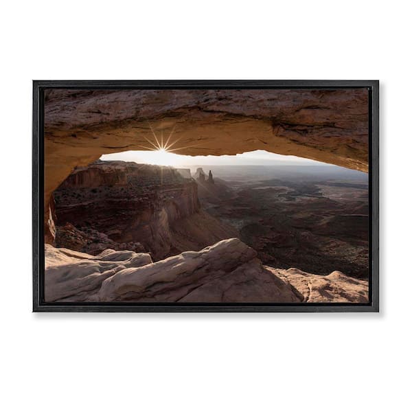 Stupell Industries Peeking Through Desert Arch by Danita Delimont Black Floater Frame Nature Graphic Art Print 21 in. x 31 in.