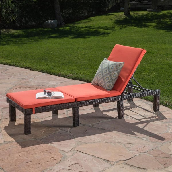 Noble House Caesar Multi-Brown Faux Rattan Outdoor Chaise Lounge with Orange Cushion