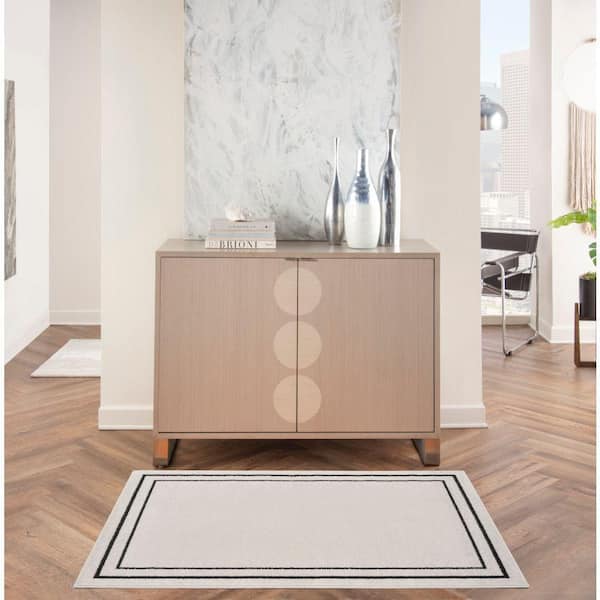 Nourison Essentials Ivory/Black 3 ft. x 5 ft. Solid Contemporary Area Rug