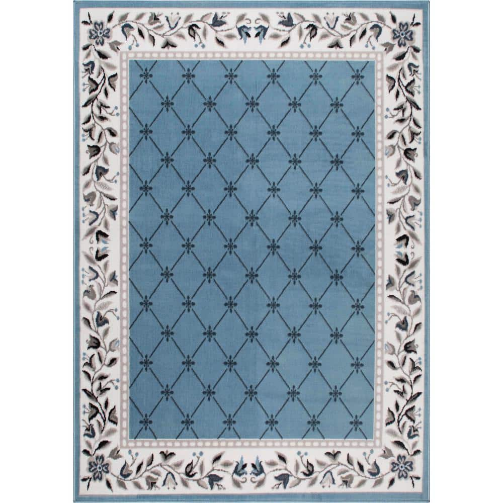 https://images.thdstatic.com/productImages/9741ffbf-4050-4db6-a9bb-b0027f0419de/svn/blue-ivory-home-dynamix-area-rugs-5-7015-327-64_1000.jpg